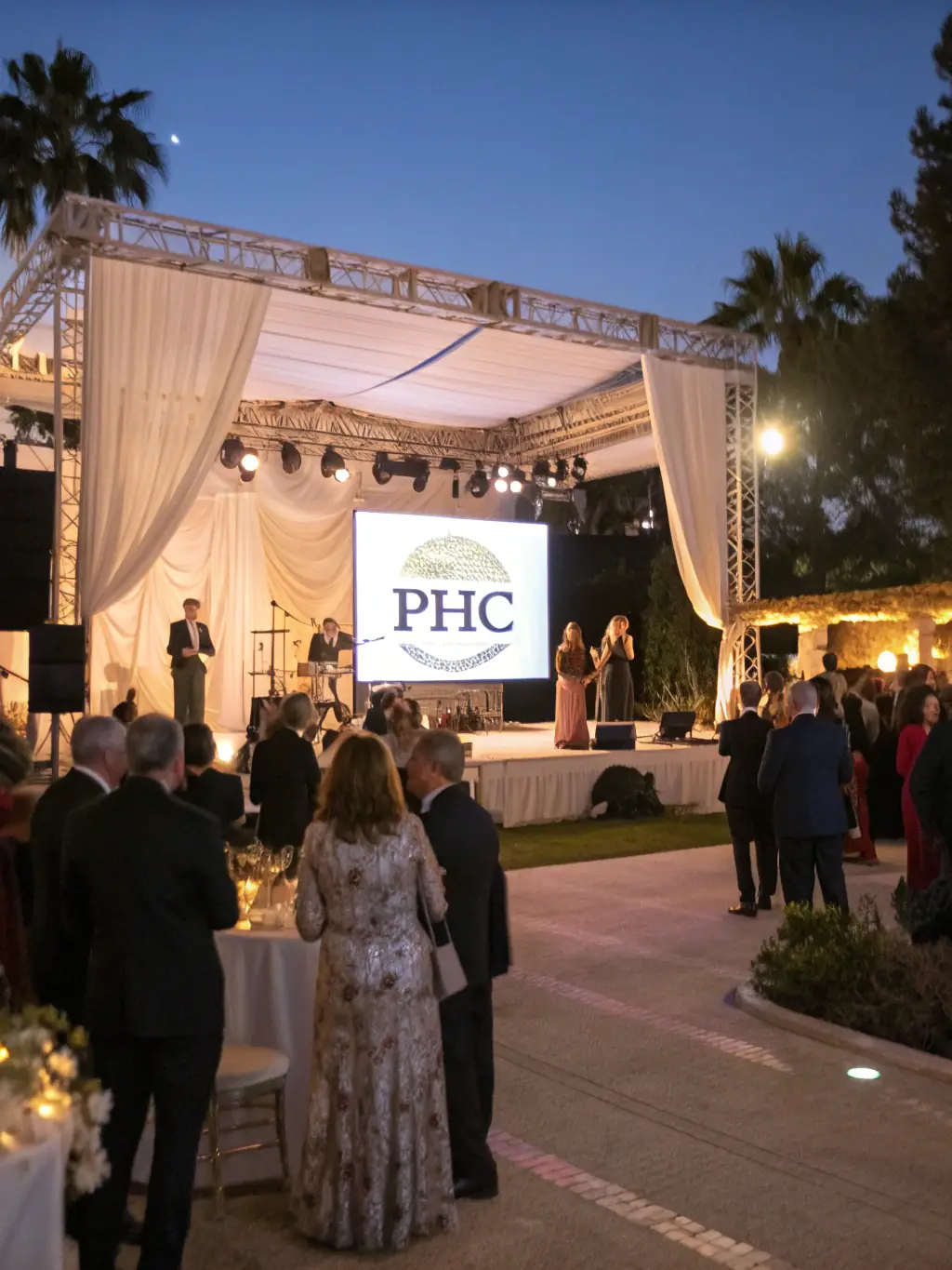 A photo of a fundraising gala held to support the restoration efforts of the Église de la Trinité La Palud, showcasing community support and engagement.